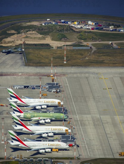 Airbus A380 for Emirates in front of completion on the apron, Finkenwerder Airport, Finkenwerder Airport, Hamburg, Free and Hanseatic City of Hamburg, Germany, Europe, aerial photograph, birds-eyes view, aerial photography, aerial photography, overview, bird's eye view