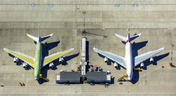 Airbus A380 for Emirates in front of completion on the apron, Finkenwerder Airport, Finkenwerder Airport, Hamburg, Free and Hanseatic City of Hamburg, Germany, Europe, aerial photograph, birds-eyes view, aerial photography, aerial photography, overview, bird's eye view