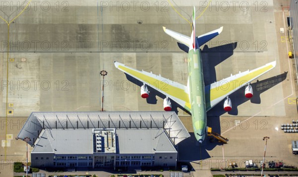 Airbus A380 for Emirates in front of completion on the apron, Finkenwerder Airport, Finkenwerder Airport, Hamburg, Free and Hanseatic City of Hamburg, Germany, Europe, aerial photograph, birds-eyes view, aerial photography, aerial photography, overview, bird's eye view