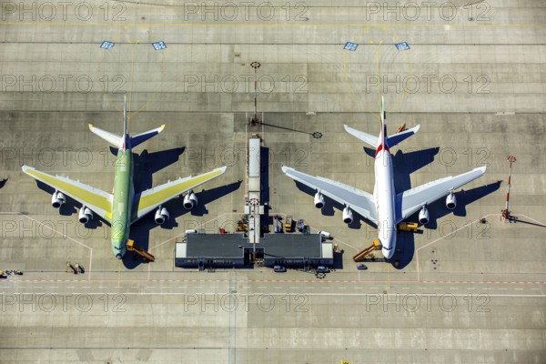 Airbus A380 for Emirates in front of completion on the apron, Finkenwerder Airport, Finkenwerder Airport, Hamburg, Free and Hanseatic City of Hamburg, Germany, Europe, aerial photograph, birds-eyes view, aerial photography, aerial photography, overview, bird's eye view