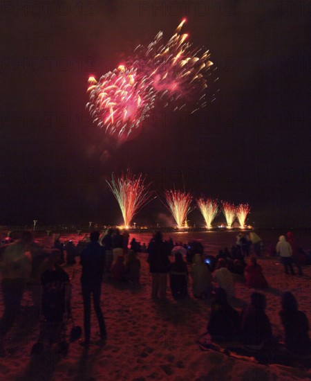 Baltic Sea in flames at Grömitz pier, fireworks, highlight of the season, end of the season, beach, spectators, beach chairs at night, shower of sparks, Baltic Sea resort, tourist attraction, Grömitz, Baltic Sea, Schleswig-Holstein, Germany, Europe, aerial photo, birds-eyes view, aerial photography, aerial photography, overview, overview, bird's-eye view