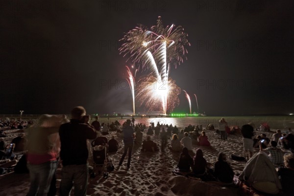 Baltic Sea in flames at Grömitz pier, fireworks, highlight of the season, end of the season, beach, spectators, beach chairs at night, shower of sparks, Baltic Sea resort, tourist attraction, Grömitz, Baltic Sea, Schleswig-Holstein, Germany, Europe, aerial photo, birds-eyes view, aerial photography, aerial photography, overview, overview, bird's-eye view
