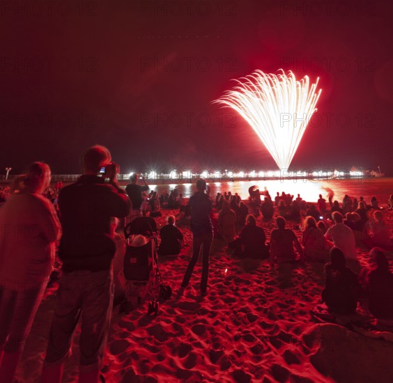 Baltic Sea in flames at Grömitz pier, fireworks, highlight of the season, end of the season, beach, spectators, beach chairs at night, shower of sparks, Baltic Sea resort, tourist attraction, Grömitz, Baltic Sea, Schleswig-Holstein, Germany, Europe, aerial photo, birds-eyes view, aerial photography, aerial photography, overview, overview, bird's-eye view
