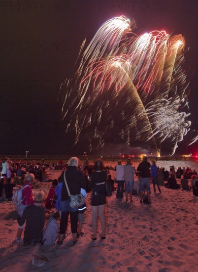 Baltic Sea in flames at Grömitz pier, fireworks, highlight of the season, end of the season, beach, spectators, beach chairs at night, shower of sparks, Baltic Sea resort, tourist attraction, Grömitz, Baltic Sea, Schleswig-Holstein, Germany, Europe, aerial photo, birds-eyes view, aerial photography, aerial photography, overview, overview, bird's-eye view