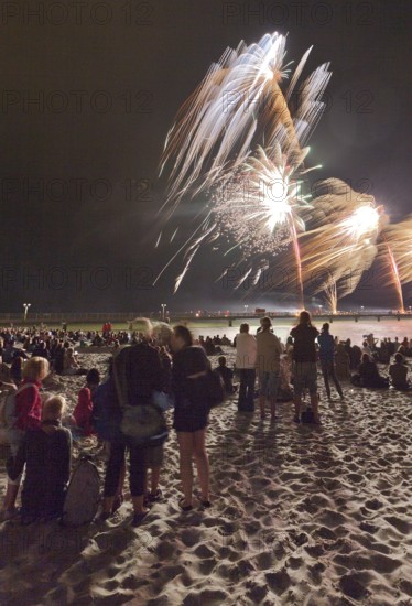 Baltic Sea in flames at Grömitz pier, fireworks, highlight of the season, end of the season, beach, spectators, beach chairs at night, shower of sparks, Baltic Sea resort, tourist attraction, Grömitz, Baltic Sea, Schleswig-Holstein, Germany, Europe, aerial photo, birds-eyes view, aerial photography, aerial photography, overview, overview, bird's-eye view