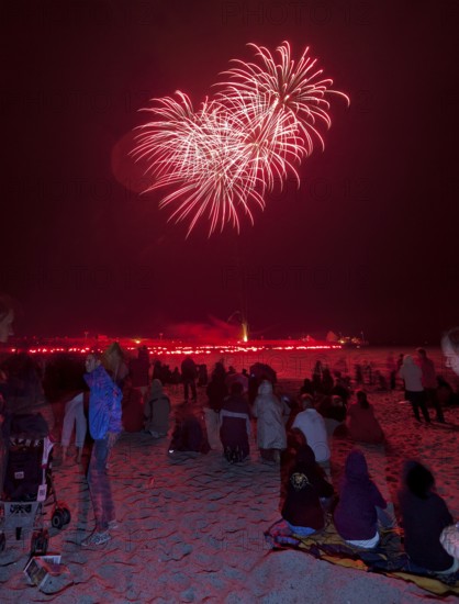 Baltic Sea in flames at Grömitz pier, fireworks, highlight of the season, end of the season, beach, spectators, beach chairs at night, shower of sparks, Baltic Sea resort, tourist attraction, Grömitz, Baltic Sea, Schleswig-Holstein, Germany, Europe, aerial photo, birds-eyes view, aerial photography, aerial photography, overview, overview, bird's-eye view