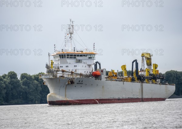 Kaishuu workship, hopper excavator also tonneau suction excavator for entertainment dredging in the Port of Hamburg, on the Elbe, Hamburg, Germany
