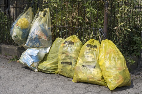Yellow bags for plastic waste are lying on the side of the road, waste separation, waste disposal, Bayreuth, Upper Franconia, Franconia, Bavaria, Germany