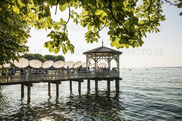 Lake pavilion with bar on the promenade, sunset, Bregenz, Lake Constance, Vorarlberg, Austria