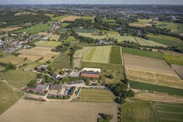 Aerial view, riding centre Oberste-Lehn, Gennebreck, Sprockhövel, Ruhr area, North Rhine-Westphalia, Germany, DE, Ennepe-Ruhr-Kreis, Europe, agriculture, agricultural fields, agricultural business, farm, aerial photography, aerial photography, aerial view, tractor mowing meadow, overview, bird's-eye view, meadows and fields, birds-eyes view, overview