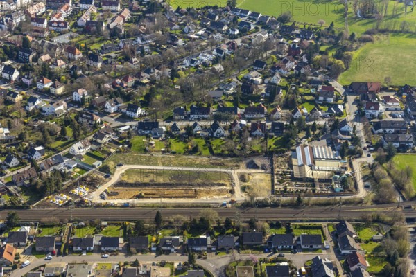 Aerial view, Drücke Garten-Zentrum Unna, construction area residential buildings, former sports field, Steinstraße, Unna, Ruhr area, North Rhine-Westphalia, Germany, railway tracks, construction work, construction area, building site, building plots, construction project, construction site, DE, development, Europe, property tax, real estate, capacity requirements, aerial view, aerial photography, aerial photography, new construction, overview, bird's-eye view, housing estate, housing and living, residential area, residential buildings, residential quality, residential neighbourhood, housing estate, birds-eyes view, overview