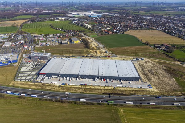 Aerial view, new construction Woolworth headquarters and logistics centre, commercial area Unna Kamen, Unna, Ruhr area, North Rhine-Westphalia, Germany, DE, Europe, commercial enterprises, commercial area, commercial park, commercial location, commercial use, freight traffic, industrial area, industrial location, logistics, logistics centre, aerial photograph, aerial photography, aerial photography, overview, bird's-eye view, bird's-eye view, overview