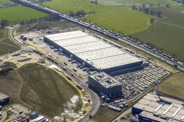 Aerial view, new Woolworth headquarters and logistics centre, Unna Kamen industrial estate, Unna-Königsborn, Kamen city limits, Südkamen, Kamen, Ruhr area, North Rhine-Westphalia, Germany, DE, Europe, commercial enterprises, commercial area, commercial park, commercial location, commercial use, freight traffic, industrial area, industrial location, logistics, logistics centre, aerial photograph, aerial photography, aerial photography, overview, bird's eye view, bird's eye view, overview