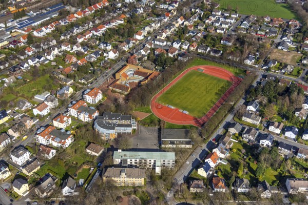 Aerial view, Peter-Weiss-Gesamtschule, old building, Herderstadion, Unna, Ruhr area, North Rhine-Westphalia, Germany, arena, education, educational institution, DE, single-family homes, Europe, comprehensive school, property tax, real estate, educational institute, aerial photography, aerial photography, terraced houses, school, sports facilities, sports field, sports facility, overview, bird's-eye view, residential complex, living and life, residential area, residential buildings, residential quality, residential neighbourhood, housing estate, birds-eyes view, overview