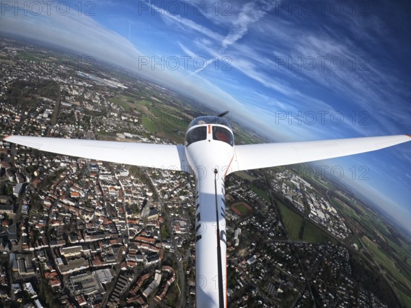 Aerial view, flight over Unna with a motor glider, city centre Unna, touring motor glider Hoffmann Dimona H36, Unna, Ruhr area, North Rhine-Westphalia, Germany, D-KAFM, DE, Europe, aerial view, aerial photography, aerial photography, motor glider, overview, bird's eye view, birds-eyes view, blue sky, overview