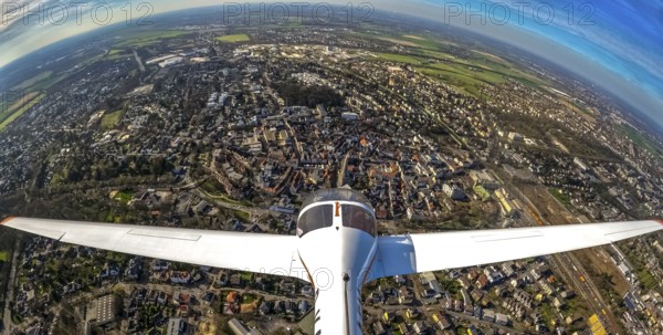 Aerial view, flight over Unna by motor glider, city centre Unna, touring motor glider Hoffmann Dimona H36, Unna, Ruhr area, North Rhine-Westphalia, Germany