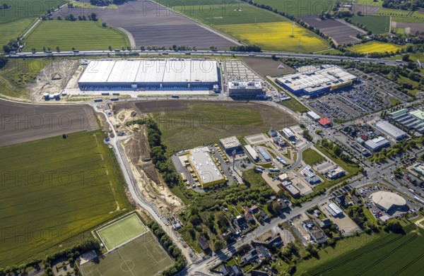 Aerial view, new Woolworth headquarters and logistics centre, commercial area Unna Kamen, Ikea furniture store, Unna, Ruhr area, North Rhine-Westphalia, Germany, A1 motorway, DE, Europe, commercial enterprises, commercial area, commercial park, commercial location, commercial use, freight traffic, industrial area, industrial location, logistics, logistics centre, aerial view, aerial photography, aerial photography, overview, bird's-eye view, overview