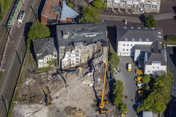 Aerial view, Bremme mill demolition for new building construction site shopping centre, Unna, Ruhr area, North Rhine-Westphalia, Germany, demolition, demolition work, Bahnhofstrasse, construction work, construction area, building site, building plots, construction project, construction site, DE, development, Europe, capacity requirement, aerial photograph, aerial photography, aerial photography, new building, sight, overview, bird's-eye view, overview, dilapidated, destroyed building