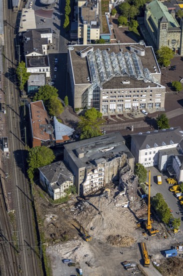 Aerial view, Unna city administration, Bremme mill demolition for new construction site shopping centre, Unna, Ruhr area, North Rhine-Westphalia, Germany, demolition, demolition work, Bahnhofstraße, construction work, construction area, building site, building plots, construction project, construction site, authority, DE, development, Europe, capacity requirements, aerial view, aerial photography, aerial photography, new building, town hall, sight, overview, bird's-eye view, overview, dilapidated, destroyed building