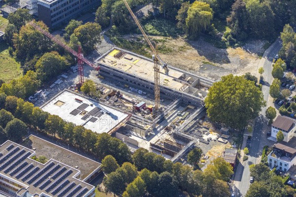 Aerial view, new construction, educational campus Unna, construction site Berliner Allee, Unna, Ruhr area, North Rhine-Westphalia, Germany, construction work, construction area, construction site, building plots, construction measure, construction project, construction site, education, educational institution, DE, development, Europe, capacity requirements, teaching institute, aerial view, aerial photography, aerial photography, new construction, school, school centre north, overview, bird's-eye view, overview