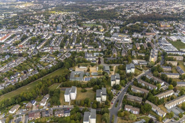 Aerial view, construction site Gerhart-Hauptmann-Schule, Städt. Community primary school, Kostenberg, Velbert, Ruhr area, North Rhine-Westphalia, Germany, Bartelskamp, construction work, building, construction area, building site, building plots, building crane, construction project, construction site, education, educational institution, DE, Europe, primary school, property tax, real estate, educational institute, aerial view, aerial photography, aerial photography, apartment buildings, apartment blocks, school, overview, bird's-eye view, housing estate, housing and living, residential area, residential buildings, residential quality, residential neighbourhood, housing estate, birds-eyes view, onlyVelbert, overview, Velbert-Mitte