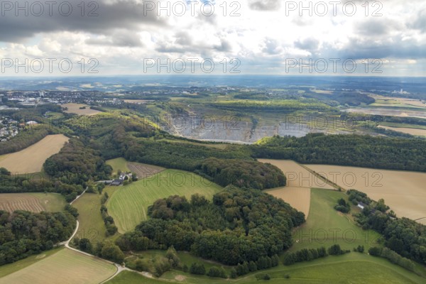 Aerial view, quarry Rützkausen, city border Velbert Wülfrath, limestone quarry, Wülfrath, Ruhr area, North Rhine-Westphalia, Germany, DE, Europe, aerial view, aerial photography, aerial photography, quarry, overview, Velbert, bird's-eye view, forest area, meadows and fields, cloud formation, birds-eyes view, overview, Velbert-Mitte