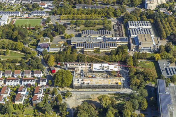 Aerial photograph, new construction, educational campus Unna, construction site Berliner Allee, Unna, Ruhr area, North Rhine-Westphalia, Germany, construction work, construction area, building site, building plots, construction project, construction site, vocational college, education, educational institution, DE, development, Europe, Geschwister-Scholl-Gymnasium Unna, Hellweg sports halls, capacity requirements, teaching institute, aerial view, aerial photography, aerial photography, new building, school, school centre north, sports hall, overview, bird's-eye view, overview