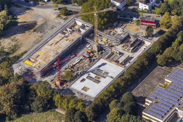 Aerial view, new construction, educational campus Unna, construction site Berliner Allee, Unna, Ruhr area, North Rhine-Westphalia, Germany, construction work, construction area, building site, building plots, construction measure, construction project, construction site, education, educational institution, DE, development, Europe, capacity requirement, teaching institute, aerial view, aerial photography, aerial photography, new construction, school, school centre north, overview, bird's-eye view, overview, construction crane