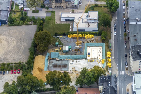 Aerial view, at the evang. Christuskirche, new parish hall, construction site for new hospice Oststraße corner Kurze Straße, Velbert, Ruhr area, North Rhine-Westphalia, Germany, place of worship, construction work, building, construction area, building site, building plots, construction project, construction site, DE, Europe, religious community, house of worship, Grünstraße, church, church community, denomination, aerial view, aerial photography, aerial photography, new building, religion, overview, bird's-eye view, birds-eyes view, onlyVelbert, overview, Velbert-Mitte