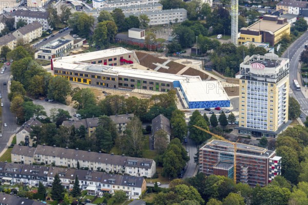 Aerial view, construction site, Kastanienallee development area, Kastanienallee primary school, BKS high-rise, Velbert, Ruhr area, North Rhine-Westphalia, Germany, construction work, building, construction area, building site, building plots, construction project, construction site, education, educational institution, DE, Europe, primary school, teaching institute, aerial view, aerial photography, aerial photography, new building, school, overview, bird's-eye view, water tower, birds-eyes view, onlyVelbert, overview, Velbert-Mitte