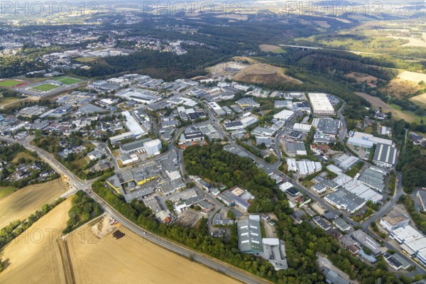 Aerial view, industrial area Röbbeck, Stahlstraße, farmland Großes Feld, planned industrial area, Langenberger Straße, construction site, spoil heap Zechenweg, Hefel, Röbbeck, Velbert, Ruhr area, North Rhine-Westphalia, Germany, spoil heap, motorway A44, motorway bridge, bridge, DE, Europe, distant view, commercial enterprises, commercial area, commercial area, commercial park, commercial location, commercial use, Hesperbach, industrial area, industrial location, aerial view, aerial photography, aerial photography, nature reserve, overview, bird's-eye view, forest area, meadows and fields, birds-eyes view, onlyVelbert, overview, Velbert-Mitte