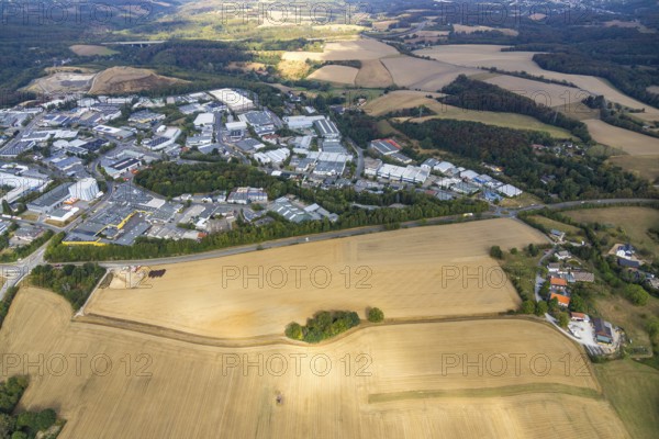 Aerial view, industrial area Röbbeck, Stahlstraße, farmland Großes Feld, planned industrial area, Langenberger Straße, construction site, spoil heap Zechenweg, Hefel, Röbbeck, Velbert, Ruhr area, North Rhine-Westphalia, Germany, spoil heap, motorway A44, motorway bridge, bridge, DE, Europe, distant view, commercial enterprises, commercial area, commercial area, commercial park, commercial location, commercial use, Hesperbach, industrial area, industrial location, aerial view, aerial photography, aerial photography, nature reserve, overview, bird's-eye view, forest area, meadows and fields, birds-eyes view, onlyVelbert, overview, Velbert-Mitte