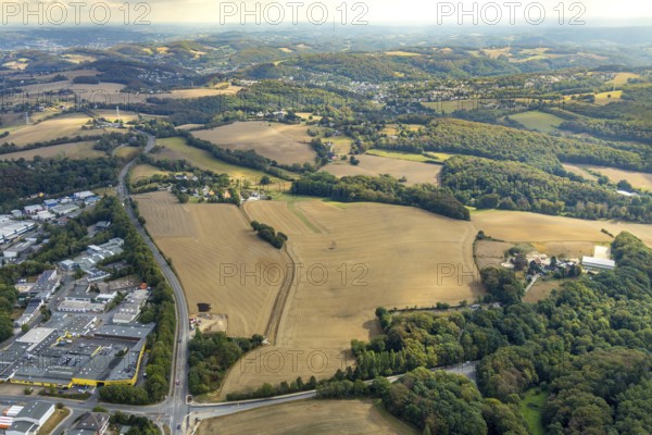 Aerial view, farmland Großes Feld, planned industrial area, Langenberger Straße, construction site, Velbert, Ruhr area, North Rhine-Westphalia, Germany, DE, Europe, commercial enterprises, commercial area, commercial park, commercial location, commercial use, industrial area, industrial location, aerial photograph, aerial photography, aerial photography, overview, bird's-eye view, meadows and fields, birds-eyes view, onlyVelbert, overview, Velbert-Mitte