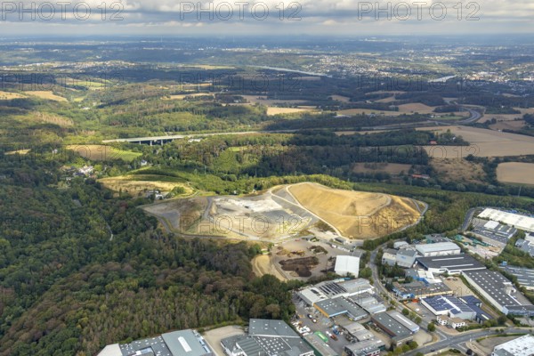 Aerial view, overburden dump Zechenweg, Hefel, industrial area Röbbeck, Stahlstraße, Röbbeck, Velbert, Ruhr area, North Rhine-Westphalia, Germany, overburden dump, motorway A44, motorway bridge, bridge, DE, Europe, distant view, commercial enterprises, commercial area, commercial park, commercial site, commercial use, Hesperbach, industrial area, industrial site, aerial view, aerial photography, aerial photography, nature reserve, overview, bird's-eye view, forest area, meadows and fields, birds-eyes view, onlyVelbert, overview, Velbert-Mitte