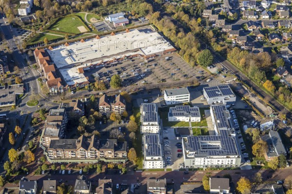 Aerial view, Senioren-Park carpe diem Voerde, Voerde, Ruhr area, North Rhine-Westphalia, Germany, retirement home, old people's home, Bahnhofstraße, care and nursing, DE, E-Center Alnwicker Ring, shopping markets, shopping square, shopping centre, Europe, aerial view, aerial photography, aerial photography, local supply centre, care facility, retirement home, retirement residence, senior citizens' home, senior citizens' centre, shopping centre, overview, bird's eye view, birds-eyes view, overview