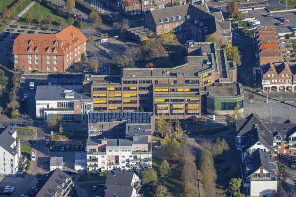 Aerial view, town hall Voerde, town hall square, hotel Niederrhein, Voerde, North Rhine-Westphalia, Germany, authority, DE, Europe, inn, gastronomy, community, commercial buildings, hotel, hotel facilities, hotel business, real estate, aerial view, aerial photography, aerial photography, Niederrhein, town hall, Ruhr area, city library Voerde, city administration, overview, accommodation, administration, bird's eye view, residential buildings, birds-eyes view, overview
