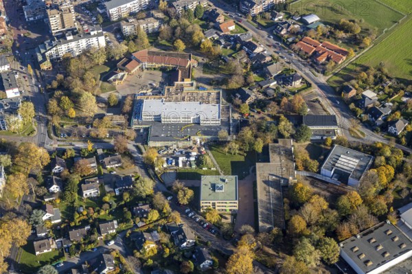 Aerial view, construction site new building Comenius comprehensive school Voerde, Voerde, Ruhr area, North Rhine-Westphalia, Germany, avenue, construction work, construction, construction area, building site, building plots, construction measure, construction project, construction site, education, educational institution, DE, Europe, comprehensive school, teaching institute, aerial view, aerial photography, aerial photography, new building, school, overview, bird's-eye view, overview