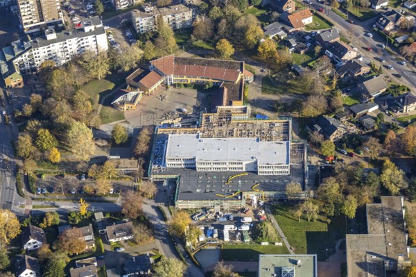 Aerial view, construction site new building Comenius comprehensive school Voerde, Voerde, Ruhr area, North Rhine-Westphalia, Germany, avenue, construction work, construction, construction area, building site, building plots, construction measure, construction project, construction site, education, educational institution, DE, Europe, comprehensive school, teaching institute, aerial view, aerial photography, aerial photography, new building, school, overview, bird's-eye view, overview