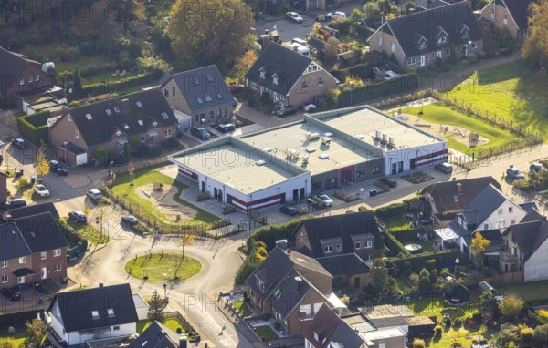 Aerial view, construction site of the new St. Antonius day-care centre, Kastanienallee, Grenzweg, Friedrichsfeld, Voerde, Ruhr area, North Rhine-Westphalia, Germany, construction area, building site, building plots, construction project, construction site, DE, Europe, kindergarten, day-care centre, day-care centre, aerial photograph, aerial photography, aerial photography, new building, overview, bird's-eye view, overview