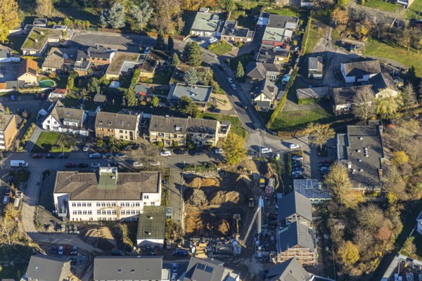 Aerial view, VHS Neukirchen-Vluyn, construction site, new building, residential area, Vluyn, Neukirchen-Vluyn, Ruhr area, North Rhine-Westphalia, Germany, construction work, building, construction area, building site, building plots, construction project, construction site, DE, Diesterwegstraße, Europe, property tax, real estate, aerial view, aerial photography, aerial photography, new construction, overview, bird's-eye view, housing estate, residential area, residential buildings, residential quality, residential neighbourhood, housing estate, birds-eyes view, overview