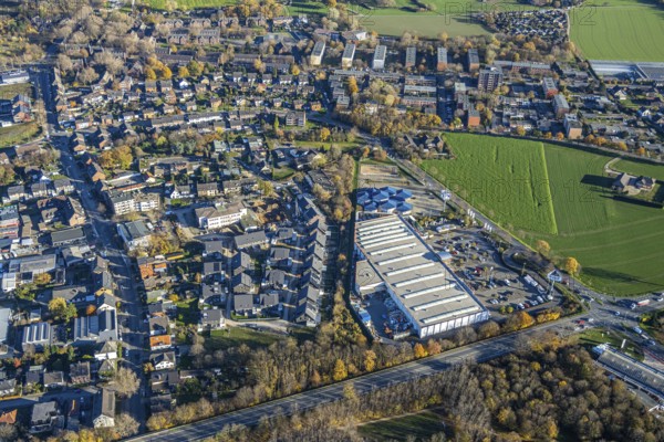 Aerial view, commercial area Lintorfer Straße, toom Baumarkt, Krämer MEGA STORE, Inneboltstraße, Neukirchen-Vluyn, Ruhr area, North Rhine-Westphalia, Germany, DE, Europe, commercial enterprises, commercial area, commercial park, commercial location, commercial use, industrial area, industrial building, industrial location, aerial view, aerial photography, aerial photography, equestrian supplies, overview, bird's-eye view, birds-eyes view, overview