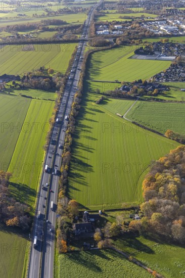 Aerial view, motorway A40, junction Neukirchen-Vluyn, commercial area Lintorfer Straße, Neukirchen, Neukirchen-Vluyn, Ruhr area, North Rhine-Westphalia, Germany, motorway junction, DE, Europe, commercial enterprises, commercial area, commercial park, commercial location, commercial use, industrial area, industrial building, industrial location, aerial view, aerial photography, aerial photography, overview, bird's-eye view, overview