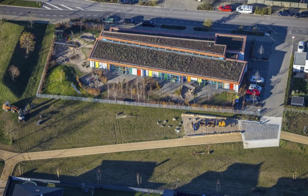 Aerial view, KiTa Sternchen Niederberg, Dicksche Heide development area, Neukirchen-Vluyn, Lower Rhine, North Rhine-Westphalia, Germany, construction area, building site, building plots, construction project, construction site, DE, Europe, property tax, real estate, kindergarten, day nursery, day nursery, day care centre, day nursery, aerial view, aerial photography, aerial photography, new building, Ruhr area, overview, bird's-eye view, housing estate, housing and living, residential area, residential buildings, residential quality, residential quarter, housing estate, birds-eyes view, overview