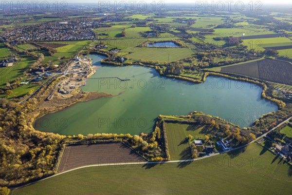 Aerial view, Krefelder Straße quarry pond, meadows and fields, Neukirchen, Neukirchen-Vluyn, Ruhr area, North Rhine-Westphalia, Germany, An der Neuen Mühle, motorway A40, Carl Risch GmbH, DE, Europe, aerial view, aerial photography, aerial photography, mill, lake, overview, bird's-eye view, overview