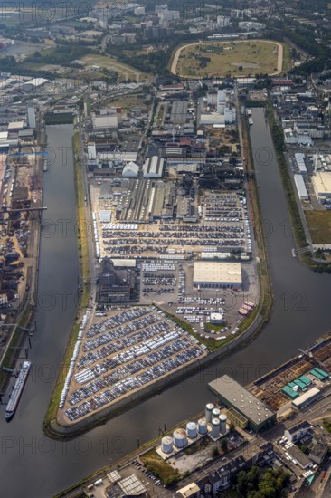 Aerial photo, harbour area, harbour facilities, Obererft, Neuss, city limits Düsseldorf, Rhineland, North Rhine-Westphalia, Germany, DE, Europe, birds-eyes view, aerial photo, aerial photography, aerial photography, overview, bird's eye view, harbour operating company, Neuss-Düsseldorfer Häfen GmbH & Co. KG, Contargo Neuss GmbH, Spedition Ansorge GmbH & Co. KG, Tanquid GmbH & Co. KG Tanklager Neuss I, Neuss customs office, Rhine, car transport, car loading, cargo ships, Neuss port, port of Neuss, port of Neuss, Rhine port, inland port, port facility, inland shipping