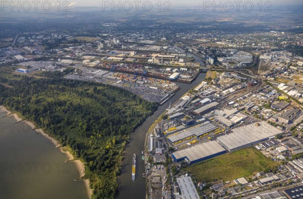 Aerial photo, harbour area, harbour facilities, Obererft, Neuss, city limits Düsseldorf, Rhineland, North Rhine-Westphalia, Germany, DE, Europe, birds-eyes view, aerial photo, aerial photography, aerial photography, overview, bird's eye view, harbour operating company, Neuss-Düsseldorfer Häfen GmbH & Co. KG, Contargo Neuss GmbH, Spedition Ansorge GmbH & Co. KG, Tanquid GmbH & Co. KG Tanklager Neuss I, Neuss customs office, Rhine, car transport, car loading, cargo ships, Neuss port, port of Neuss, port of Neuss, Rhine port, inland port, port facility, inland shipping