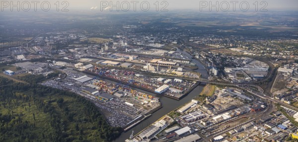 Aerial photo, harbour area, harbour facilities, Obererft, Neuss, city limits Düsseldorf, Rhineland, North Rhine-Westphalia, Germany, DE, Europe, birds-eyes view, aerial photo, aerial photography, aerial photography, overview, bird's eye view, harbour operating company, Neuss-Düsseldorfer Häfen GmbH & Co. KG, Contargo Neuss GmbH, Spedition Ansorge GmbH & Co. KG, Tanquid GmbH & Co. KG Tanklager Neuss I, Neuss customs office, Rhine, car transport, car loading, cargo ships, Neuss port, port of Neuss, port of Neuss, Rhine port, inland port, port facility, inland shipping