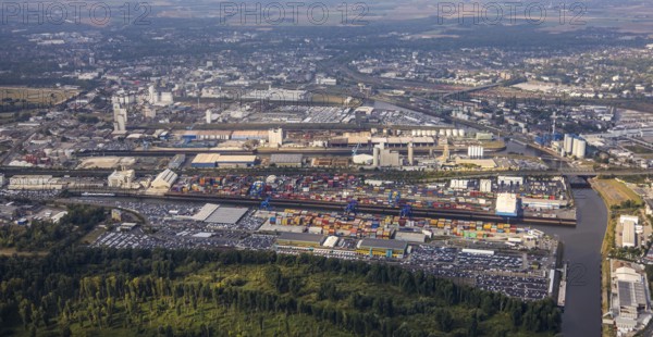 Aerial view, harbour area, harbour facilities, Contargo Neuss GmbH, container loading, container ship, Obererft, Neuss, city limits Düsseldorf, Rhineland, North Rhine-Westphalia, Germany, DE, Europe, birds-eyes view, aerial view, aerial photography, aerial photography, overview, bird's eye view, port operating company, Neuss-Düsseldorfer Häfen GmbH & Co. KG, Spedition Ansorge GmbH & Co. KG, Tanquid GmbH & Co. KG Tanklager Neuss I, Neuss customs office, Rhine, car transport, car loading, cargo ships, BLG AutoTransport GmbH & Co. KG, Neuss harbour, Neuss port, port of Neuss, Rhine port, inland port, port facility, inland shipping