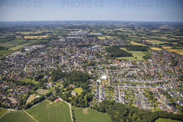 Aerial view, view of the town, Schwesternbusch forest, St. Dionysius Catholic Church, St. Francis House, Cardinal von Galen Comprehensive School, Nordwalde, Münsterland, North Rhine-Westphalia, Germany. Franziskus-Haus, Kardinal von Galen Comprehensive School, Nordwalde, Münsterland, North Rhine-Westphalia, Germany, retirement home, retirement home for religious, retirement home, old people's home, place of worship, care and nursing, education, educational institution, DE, Europe, distant view, comprehensive school, religious community, place of worship, church, parish, denomination, educational institute, aerial view, aerial photography, aerial photography, care facility, religion, school, retirement home, retirement home, retirement home, retirement centre, townscape, city area, overview, bird's-eye view, overview