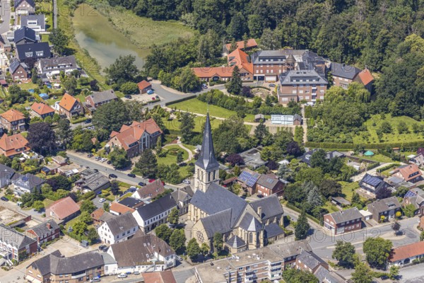 Aerial view, St. Dionysius Catholic Church, Kirchstraße, St. Franziskus-Haus, Pröbstingstraße, Nordwalde, Münsterland, North Rhine-Westphalia, Germany, retirement home, retirement home for religious, retirement home, retirement home, place of worship, care and nursing, DE, Europe, religious community, place of worship, church, parish, denomination, aerial view, aerial photography, aerial photography, care facility, religion, religious institution, retirement home, retirement residence, retirement home, senior citizens' centre, overview, bird's eye view, living and life, birds-eyes view, overview